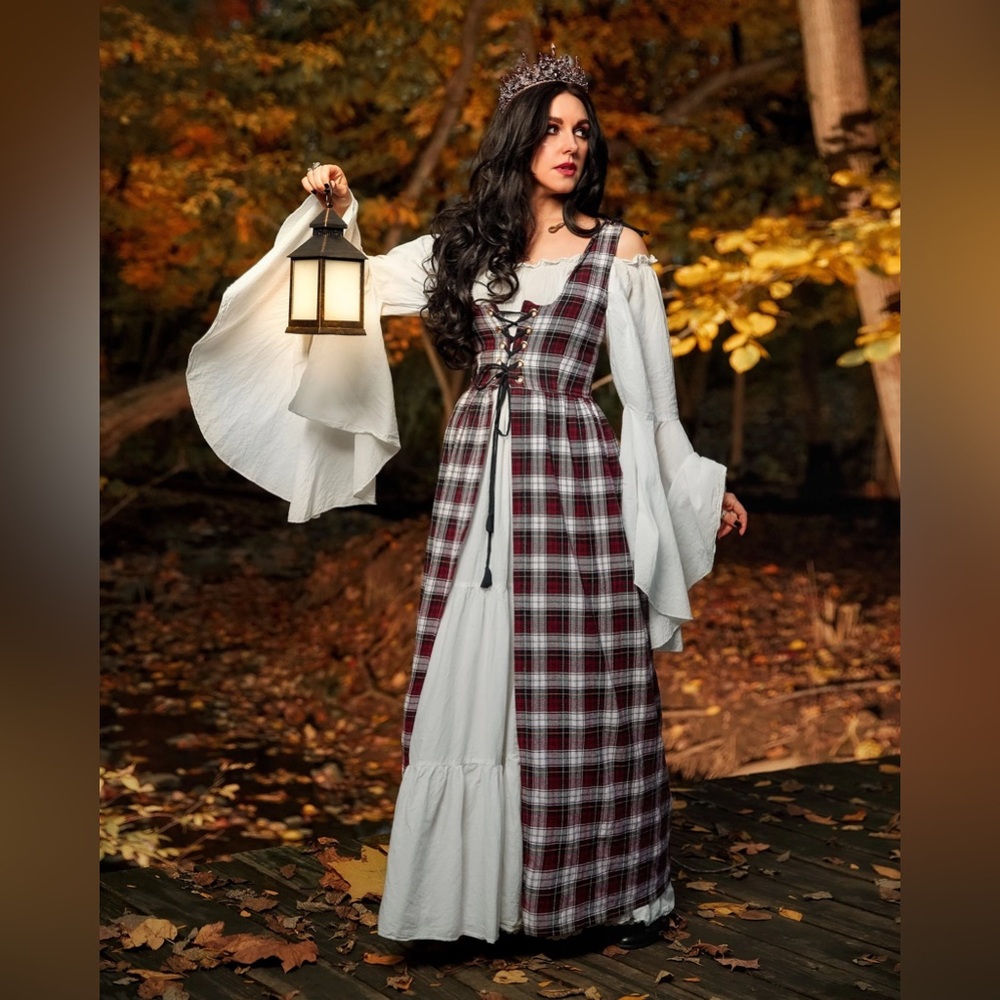 This is a plaid midi dress with a lace-up front.